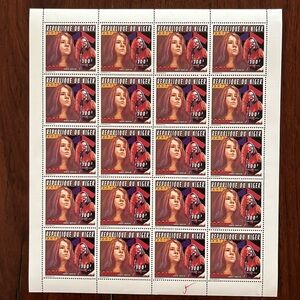 Collectible 1996 Jerry Garcia and Janis Joplin stamps from Niger